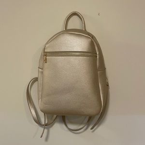 Gold backpack purse